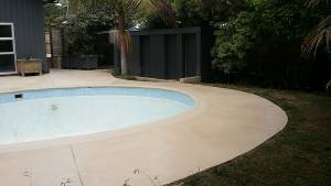 Resurfaced concrete around pool